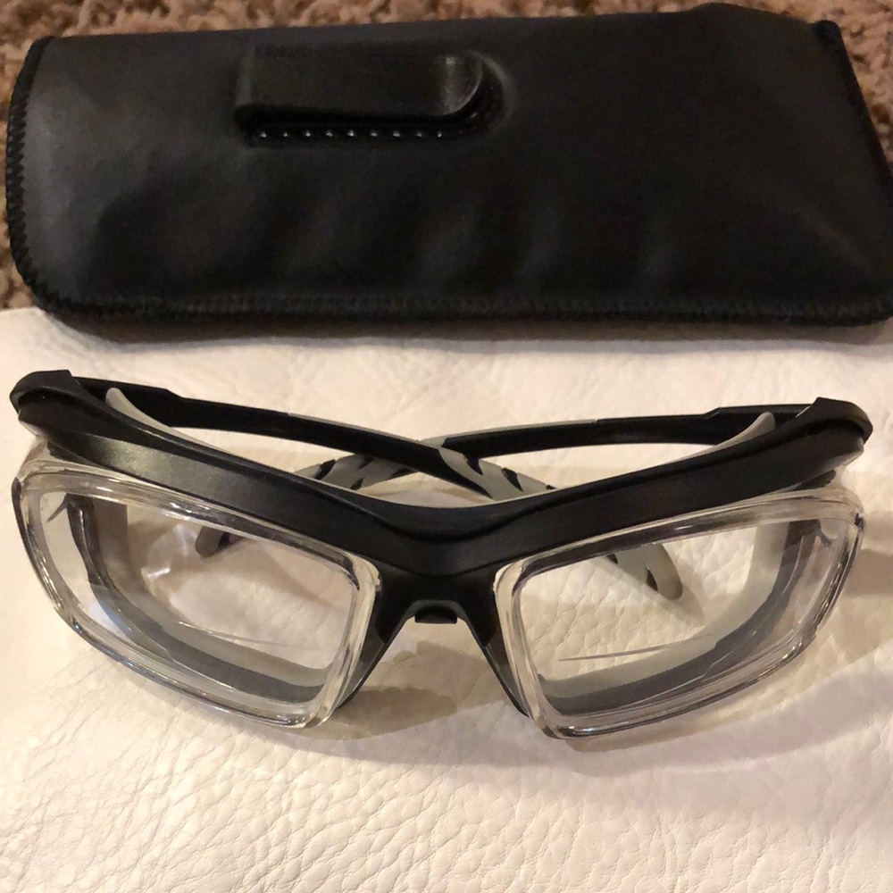 Black Wraparound Eyeglasses with Clear and bifocal lenses marked ArmourX EUC